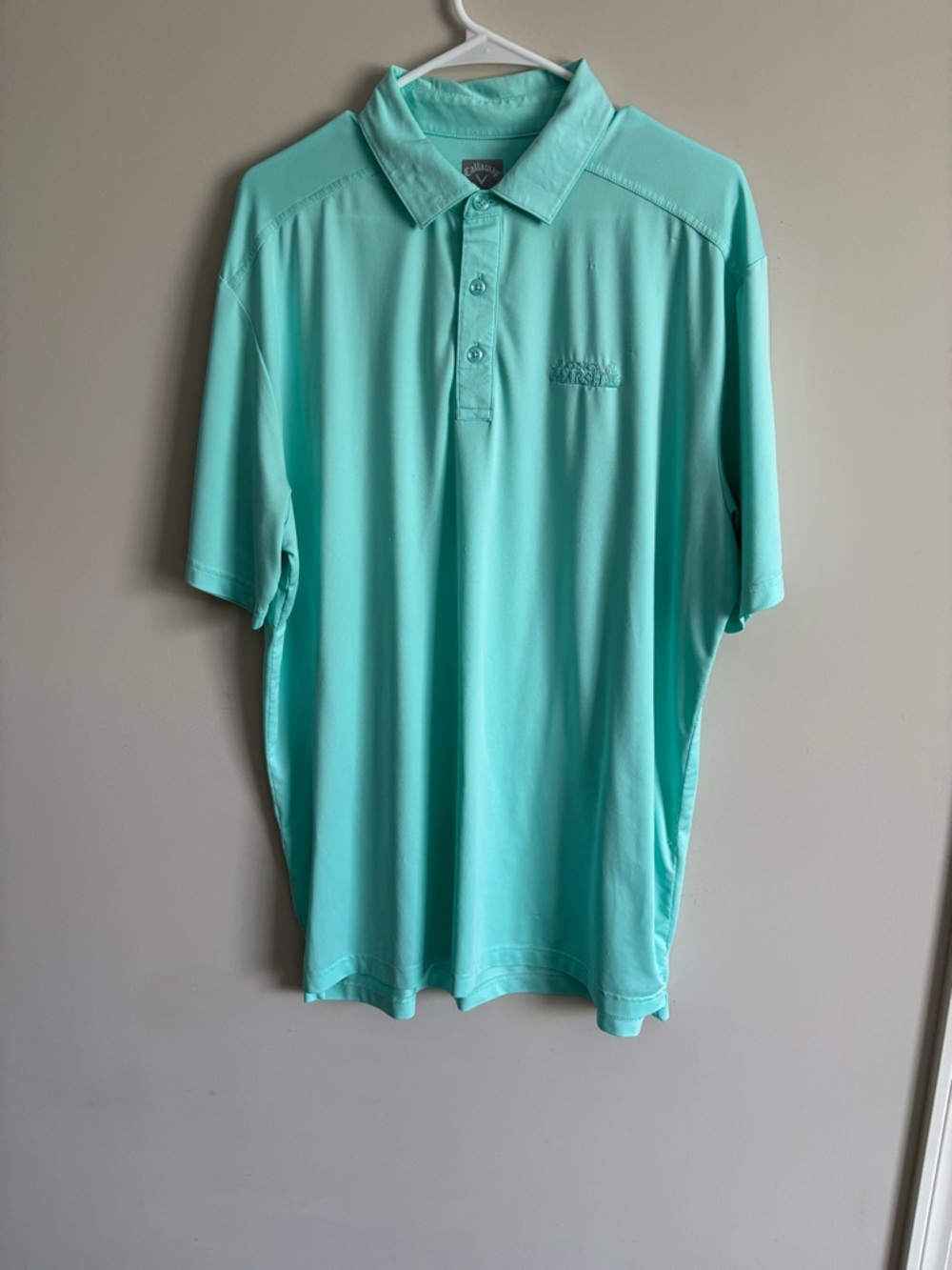 Callaway Men’s Aqua Green Performance Polo. Longer length